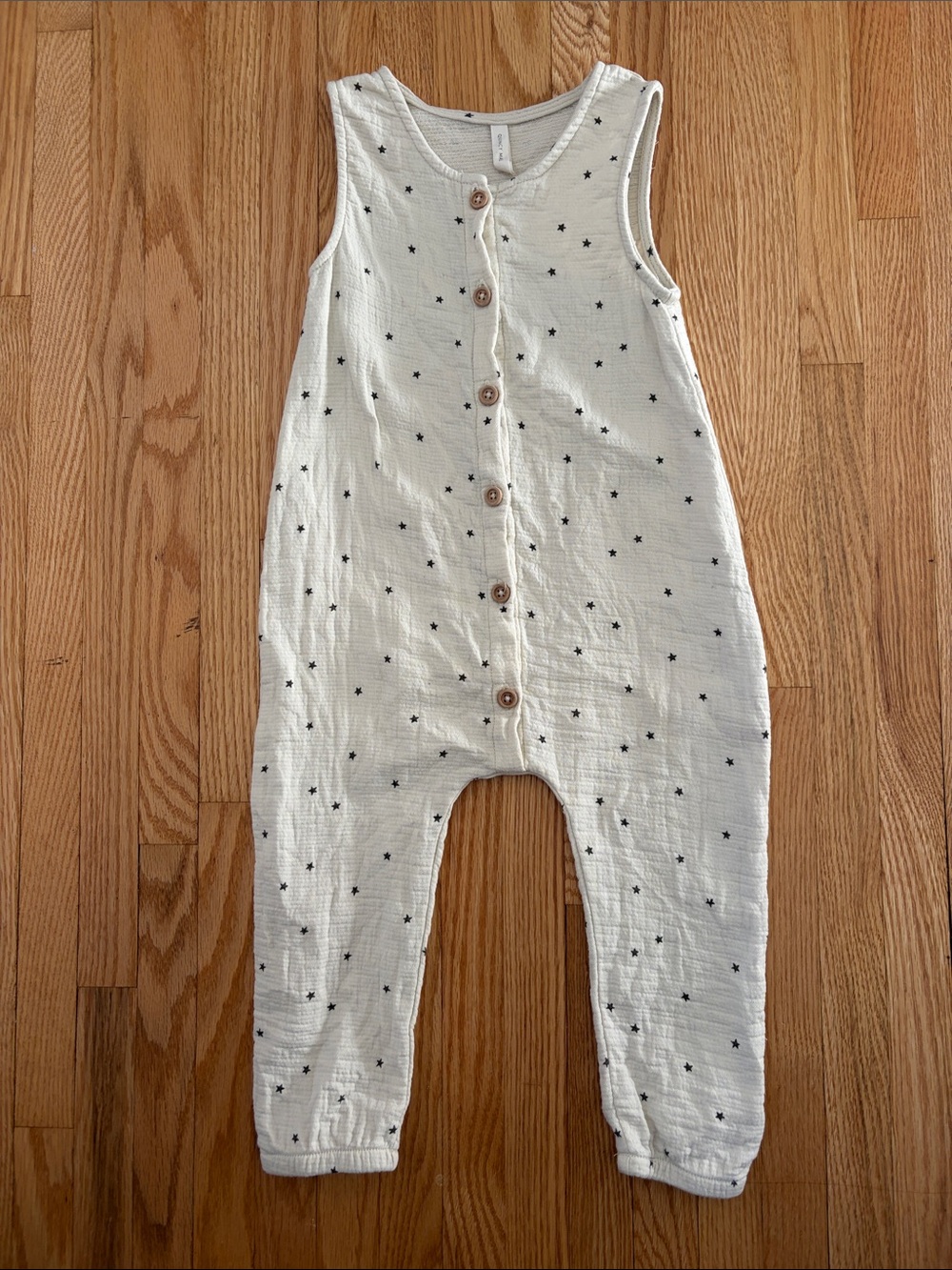 Quincy Mae Cream Romper with Black Star Print 18-24Mo